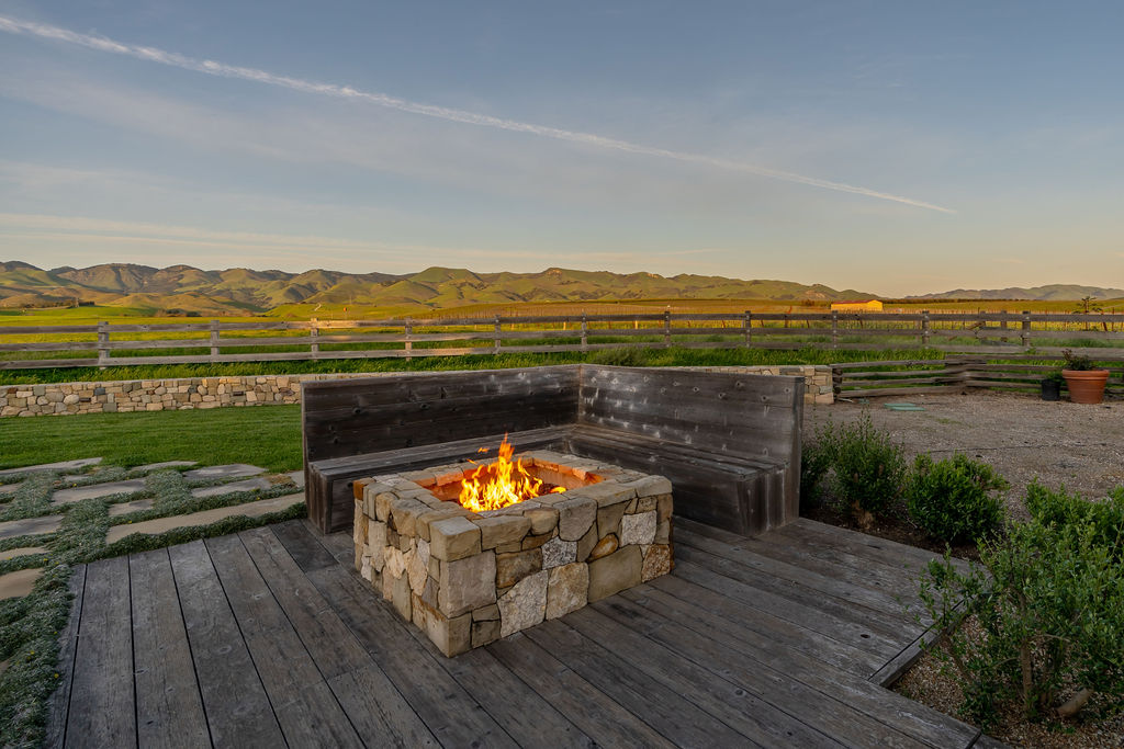 Vineyard House exterior, view 9 of the grounds, pool, decks, and vineyards
