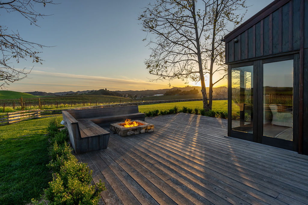 Vineyard House exterior, view 12 of the grounds, pool, decks, and vineyards
