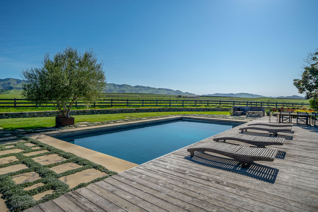 Vineyard House exterior, view 20 of the grounds, pool, decks, and vineyards
