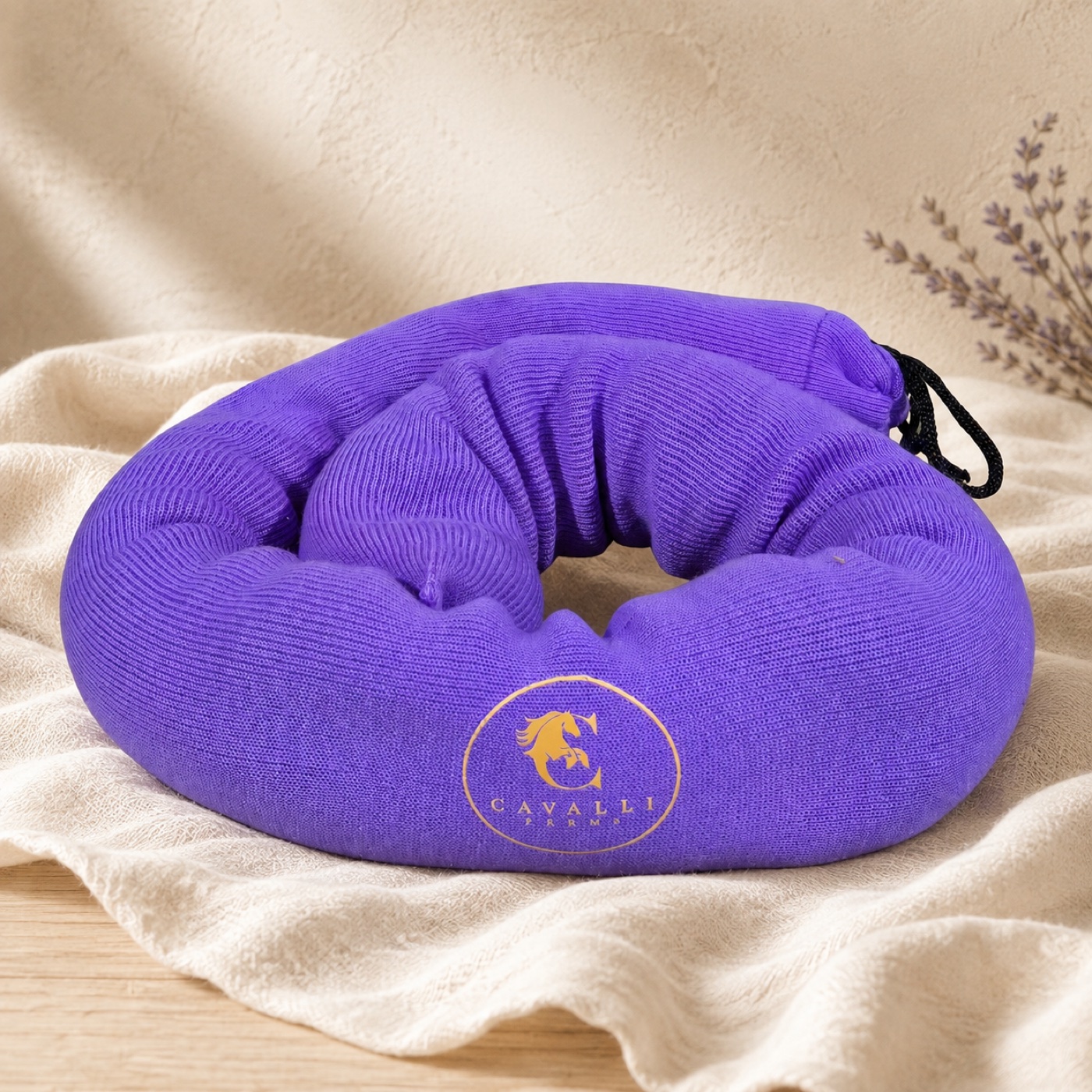 The LavaNoodle, a purple lavender-filled door draft blocker with the Cavalli Farms mark